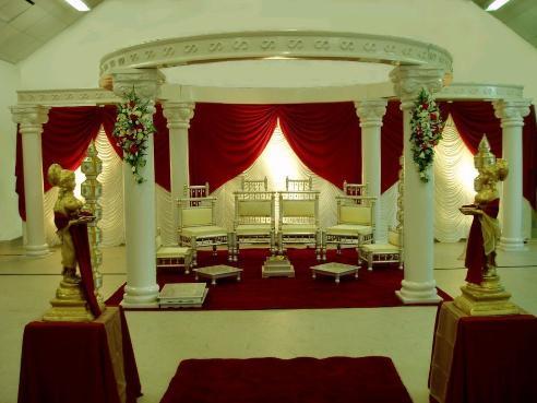 DECORATED ROUND PILLARS WEDDING MANDAP