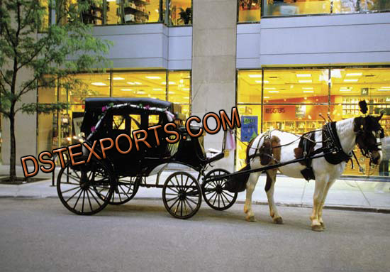 BLACK COVERED HORSE DRAWN CARRIAGE