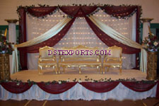 DESIGNER STAGE WITH GOLDEN FURNITURE