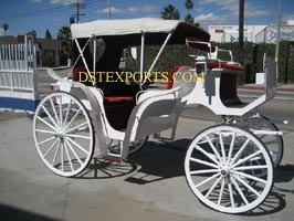 WHITE VICTORIA HORSE DRAWN CARRIAGE