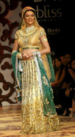 INDIAN WEDDING SUSH GOLDAN GREEN LEHENGA